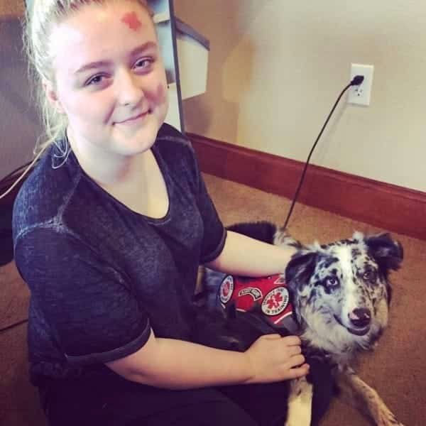 teen has seizure service dog distracted