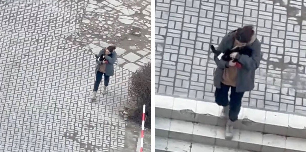 Woman In Ukraine Seen Comforting a Cat as Air Raid Sirens Sound